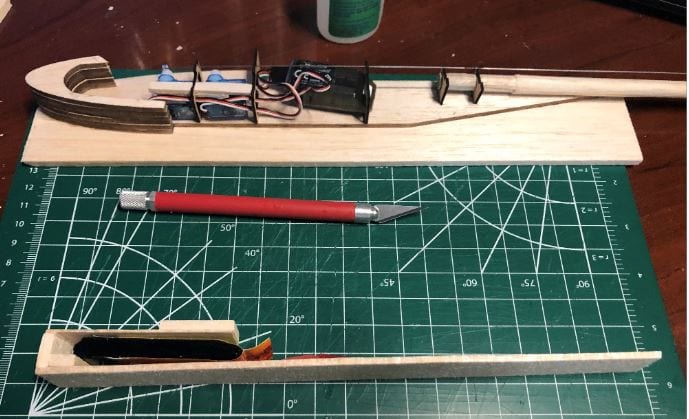 a balsa airplane kit and rc glider kit in progress
